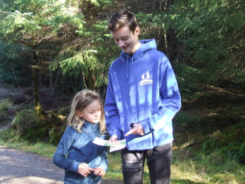 Logan coaching his young cousin