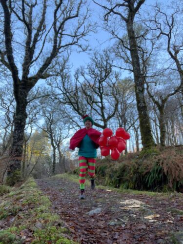 Mrs Christmas galloping through the forest
